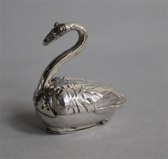 A continental white metal novelty pepperette modelled as a swan, 44mm.